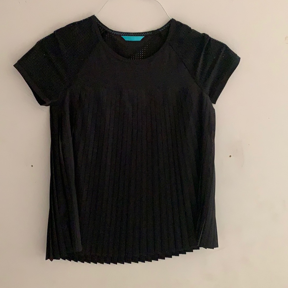 A black shirt from ivivva Girls size 12